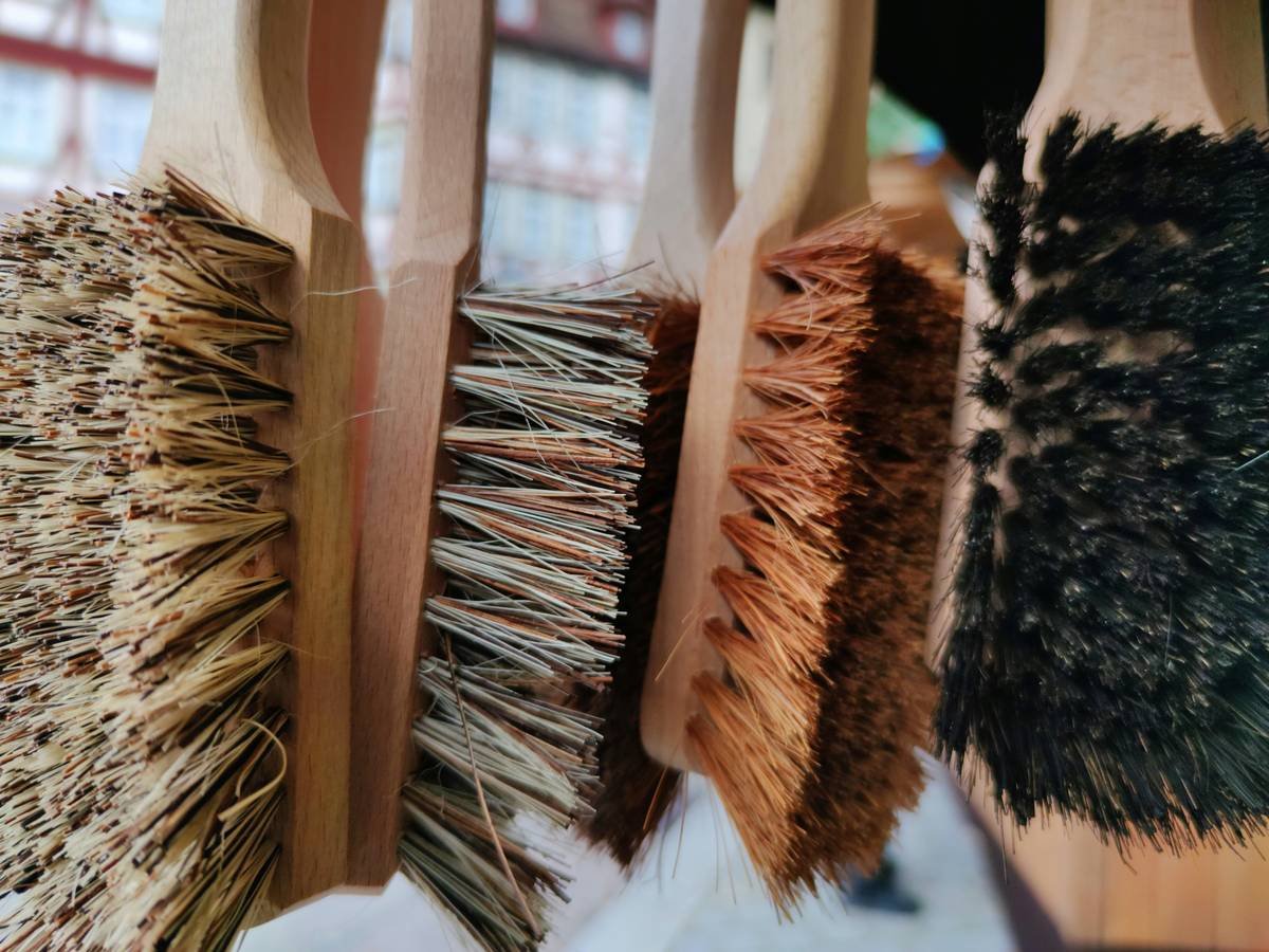 close-up of high control beard brush showing dense dual-layer bristles and ergonomic handle